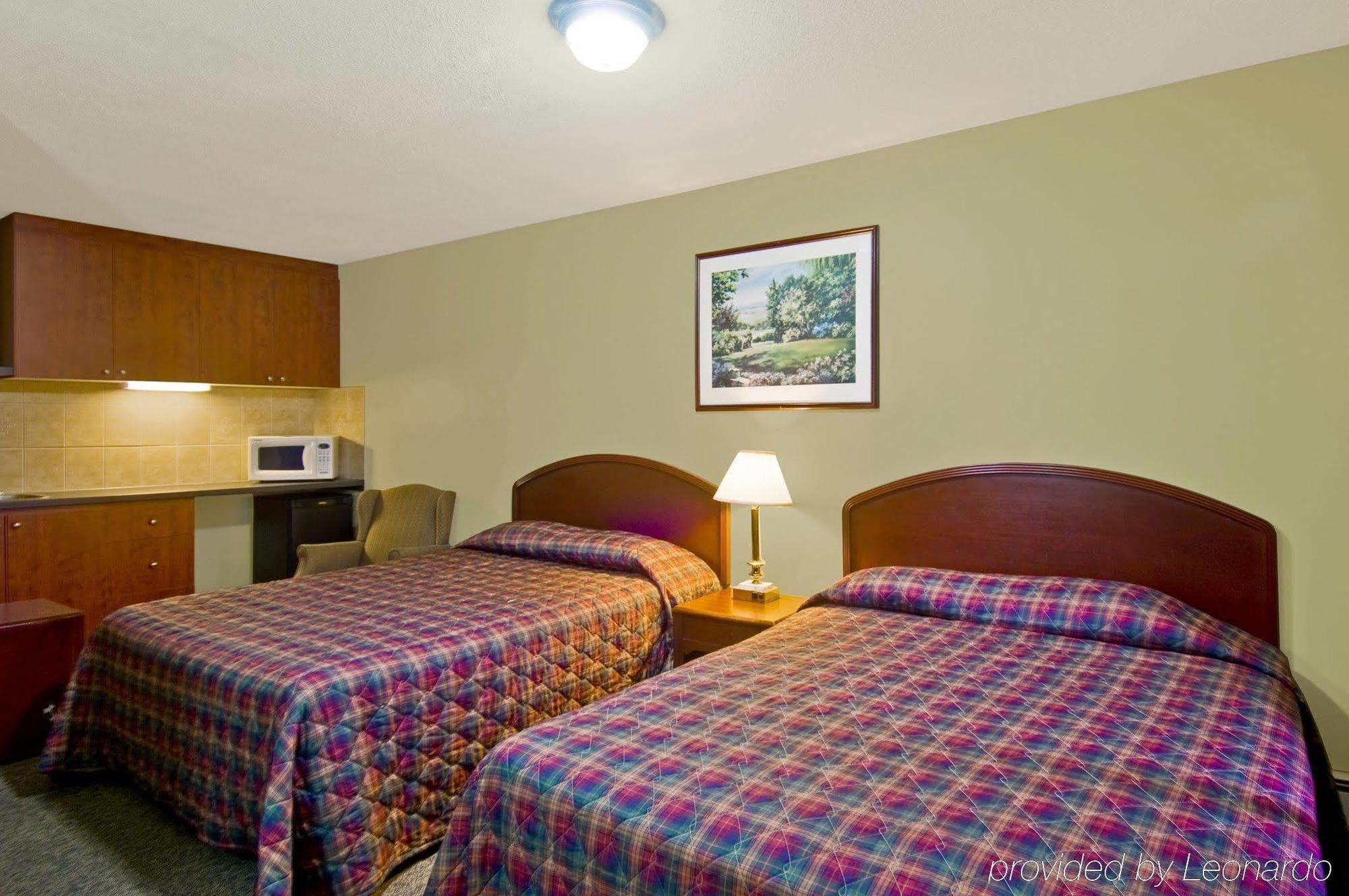 Burlington Inn Quarto foto